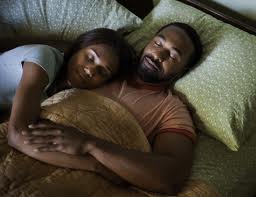 black couple sleeping