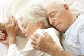 elderly couple sleeping